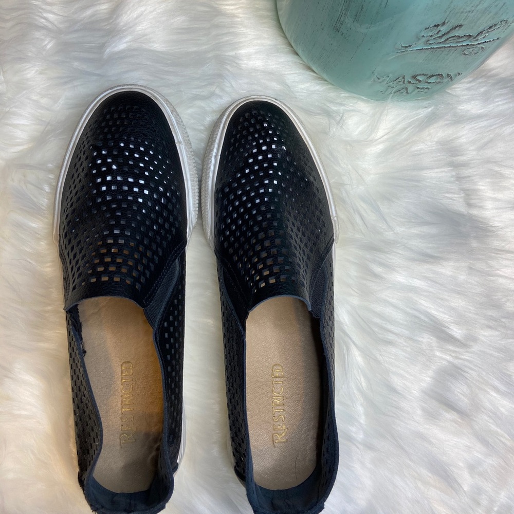 Black stylish slip-ons